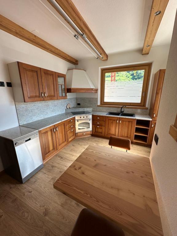 Kuchyň nebo kuchyňský kout v ubytování Alpen Hotel Chalet