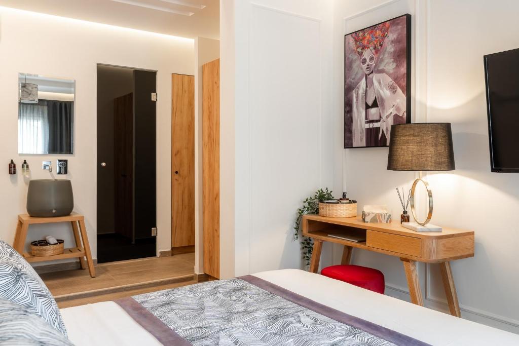 Łóżko lub łóżka w pokoju w obiekcie Garment District Suites