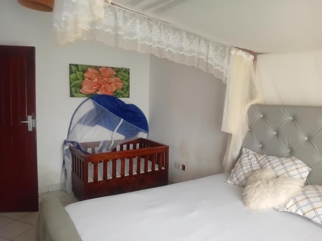 Postel nebo postele na pokoji v ubytování HIDEOUT Villa