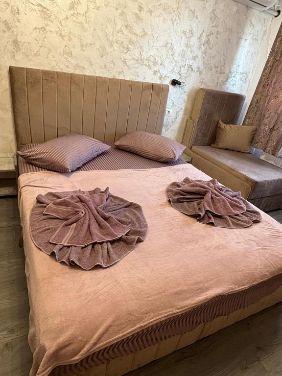 Postel nebo postele na pokoji v ubytování AmA