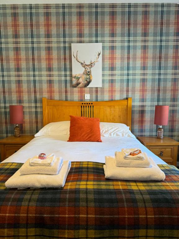 Postel nebo postele na pokoji v ubytování The Mey Hotel