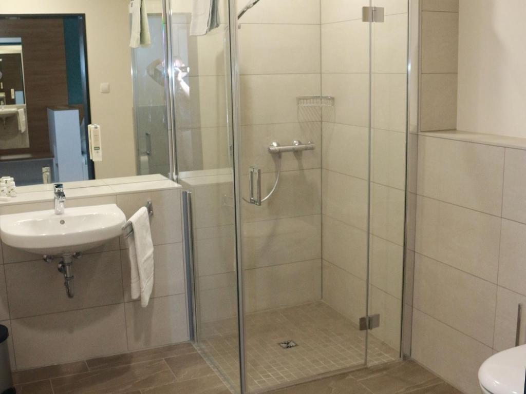 Koupelna v ubytování Leben wie im Hotel by Helios