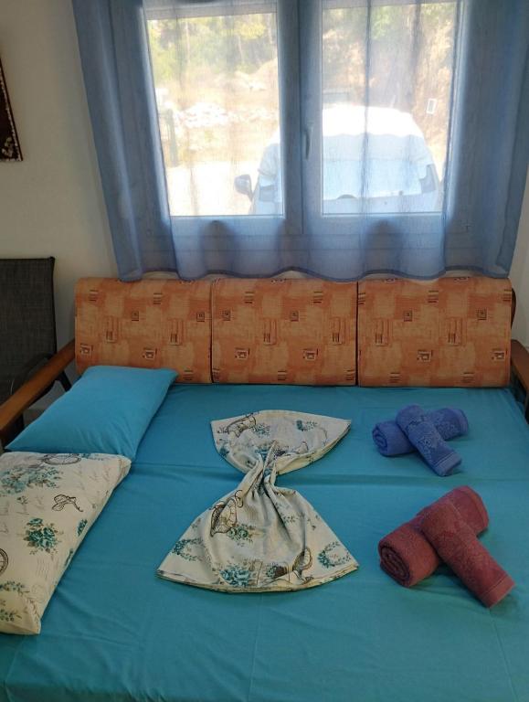 Postel nebo postele na pokoji v ubytování Villa Platskos vol 2