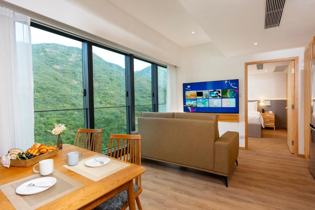 TV i/ili multimedijalni sistem u objektu Shama Hub Metro South Hong Kong