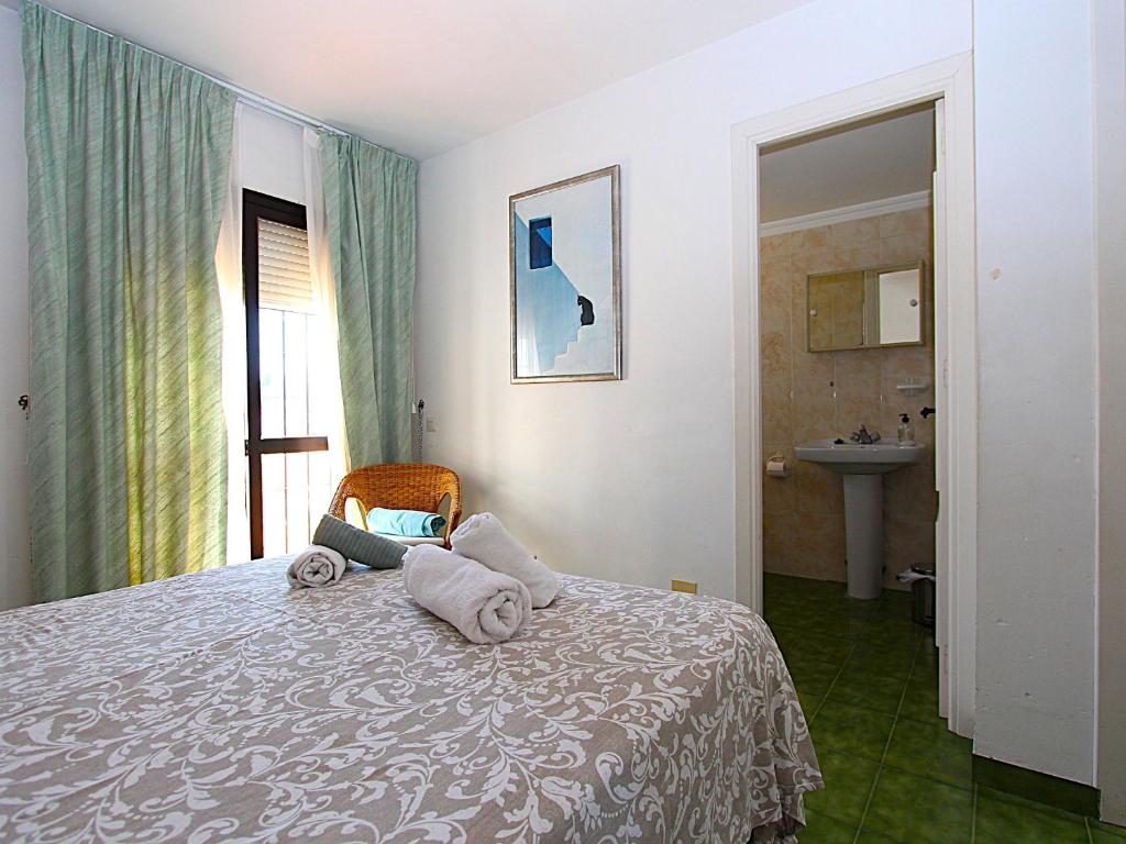 Łóżko lub łóżka w pokoju w obiekcie Casablanca Villas
