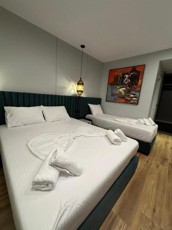 Postel nebo postele na pokoji v ubytování Hotel Lili-1