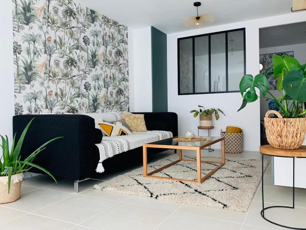 Posezení v ubytování Logement cosy en centre ville