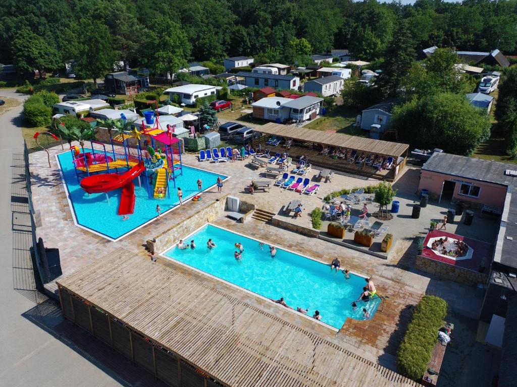 an aerial view of a pool with a water park at Eurocamp Spreewaldtor in Groß Leuthen
