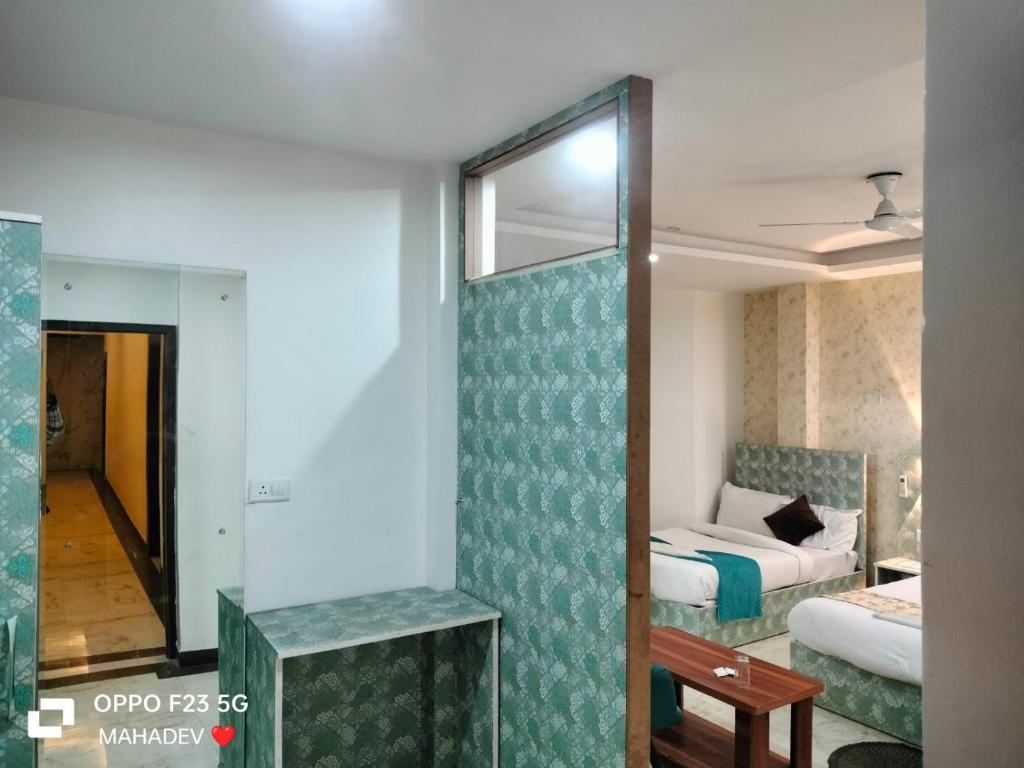 Ένα ή περισσότερα κρεβάτια σε δωμάτιο στο Hotel Hayat Inn