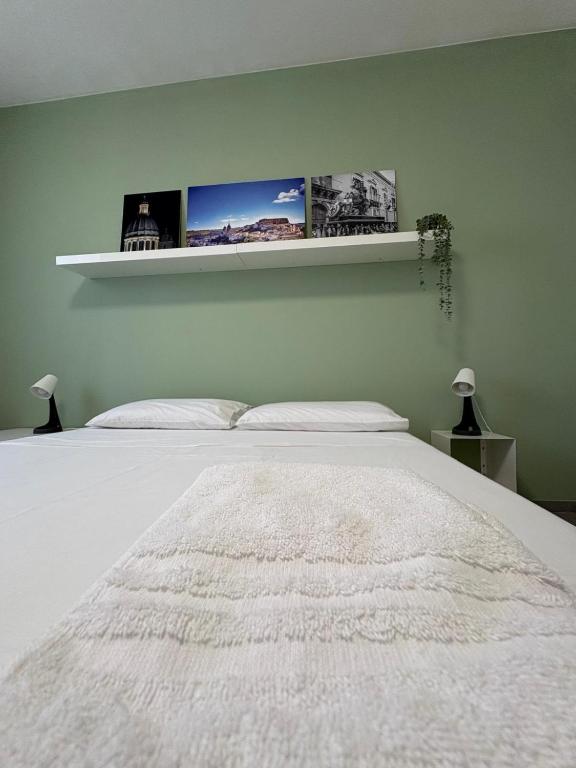 Postel nebo postele na pokoji v ubytování Casa Rogos