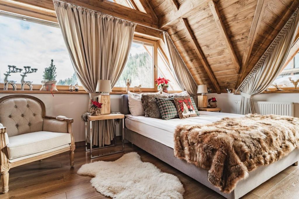 Posteľ alebo postele v izbe v ubytovaní Nosalowski Wypas Jacuzzi & Sauna