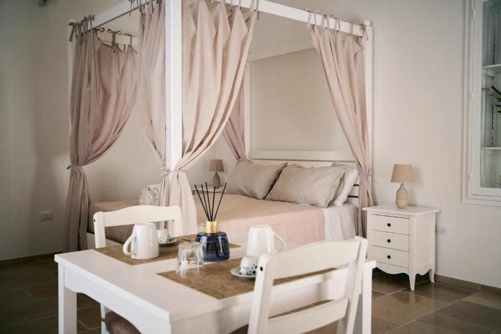 En eller flere senge i et værelse på La Casa di Mary