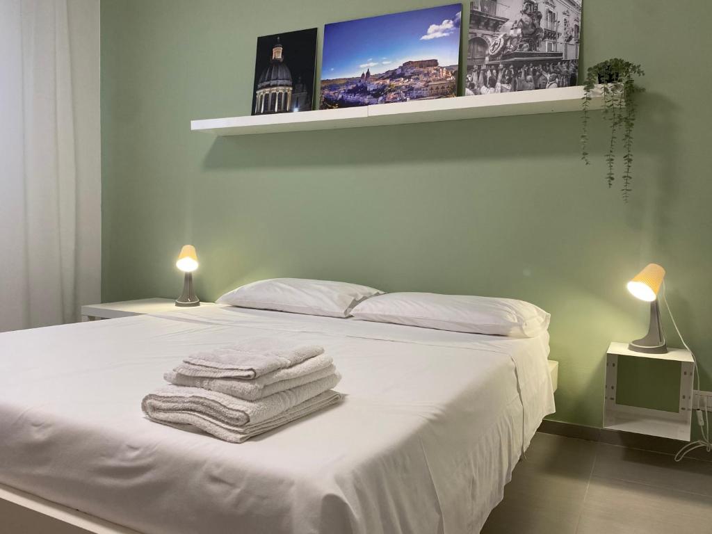 Postel nebo postele na pokoji v ubytování Casa Rogos