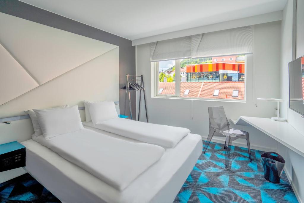Postel nebo postele na pokoji v ubytování Magic Hotel Solheimsviken
