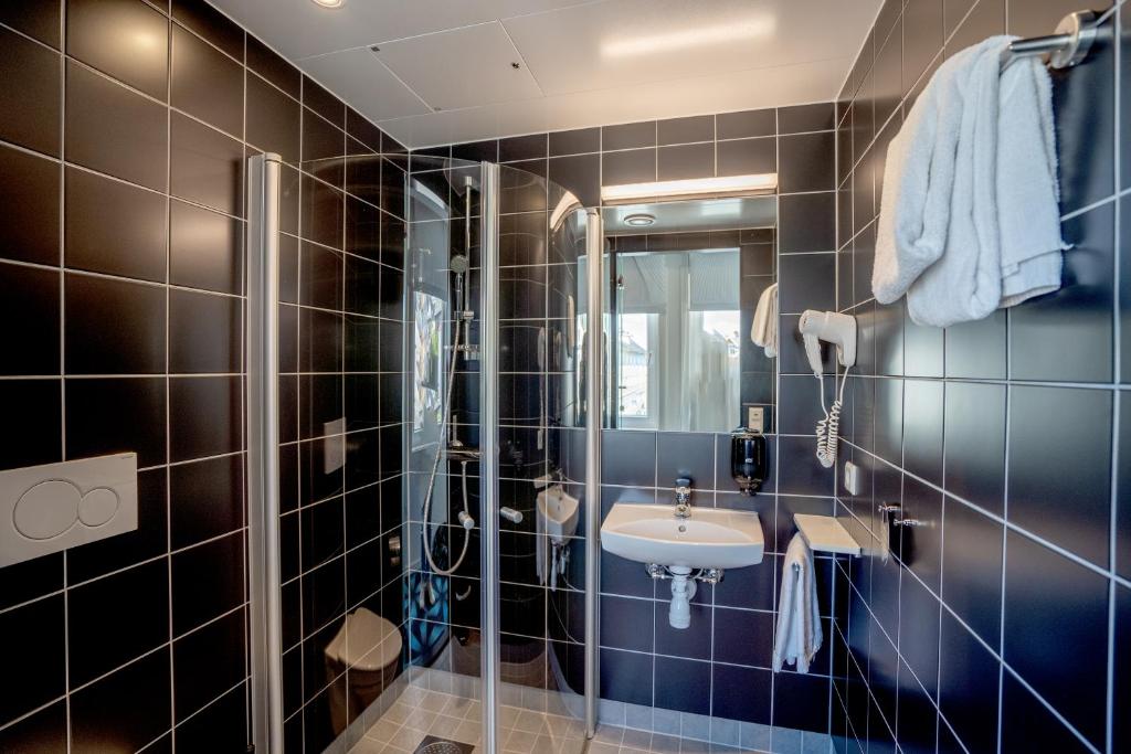 Koupelna v ubytování Magic Hotel Solheimsviken