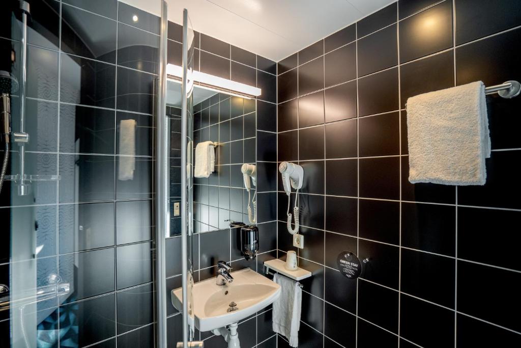 Koupelna v ubytování Magic Hotel Solheimsviken