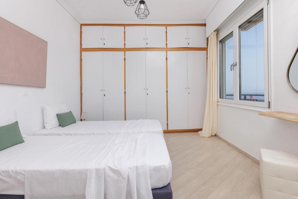 Postel nebo postele na pokoji v ubytování Akakia Panoramic Villa