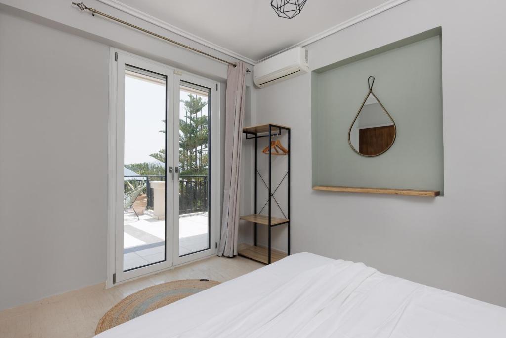 Postel nebo postele na pokoji v ubytování Akakia Panoramic Villa