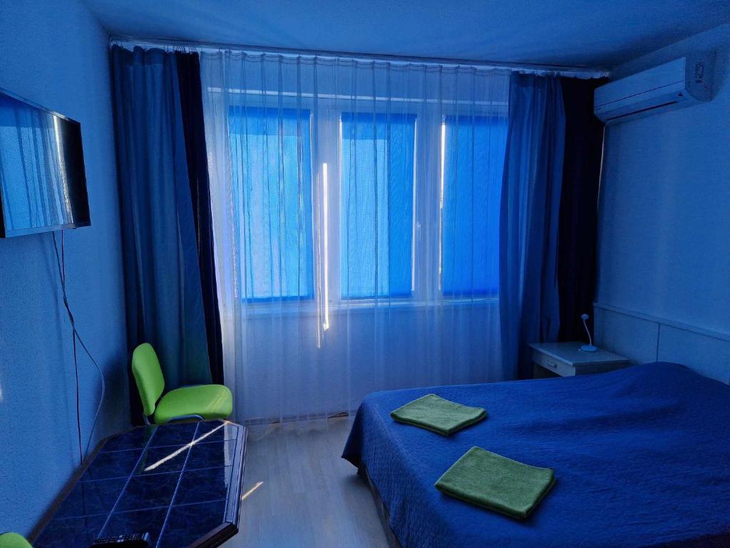 Posteľ alebo postele v izbe v ubytovaní Luna Apartman501