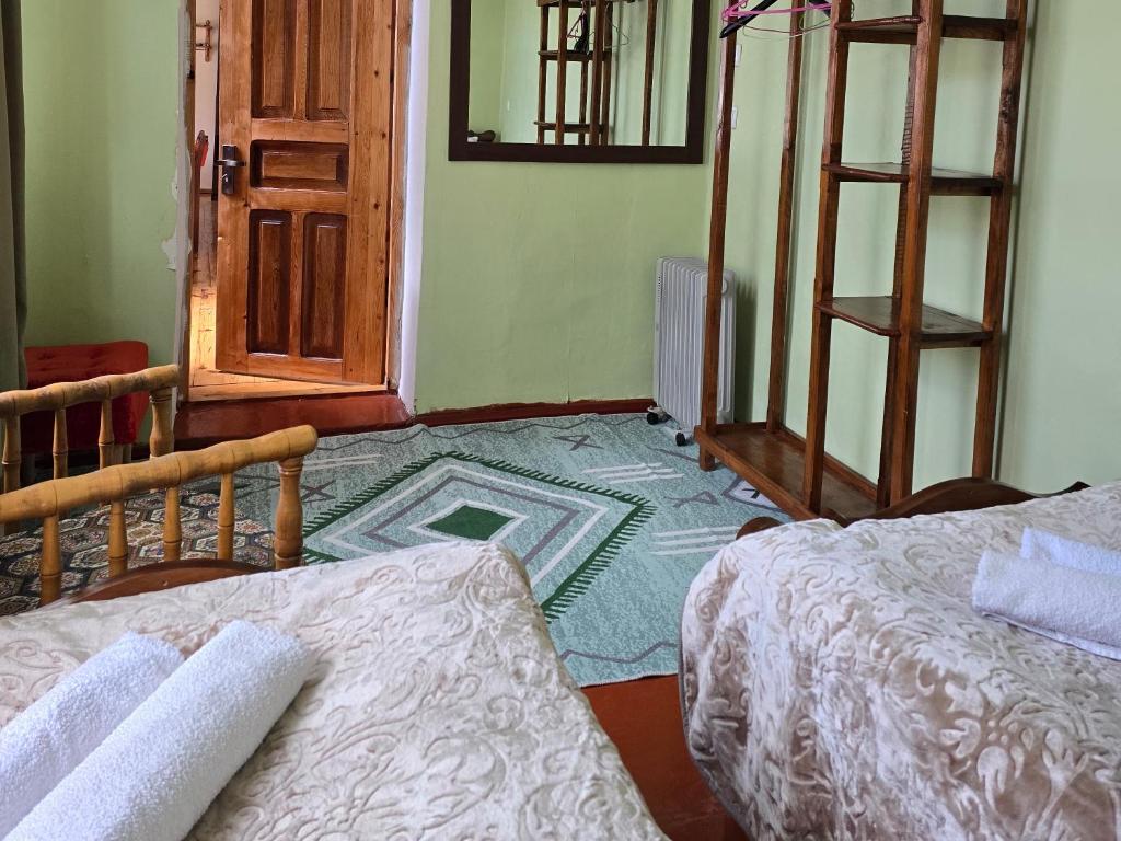 Postel nebo postele na pokoji v ubytování Ailama Guesthouse