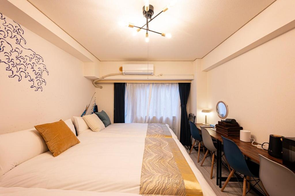 Postel nebo postele na pokoji v ubytování 6min Shibuya Station 4 Max A165