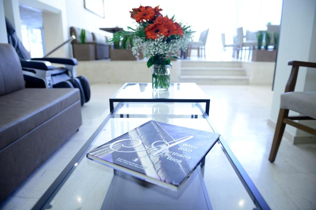 Uma área de estar em Phidias Hotel by Oniro