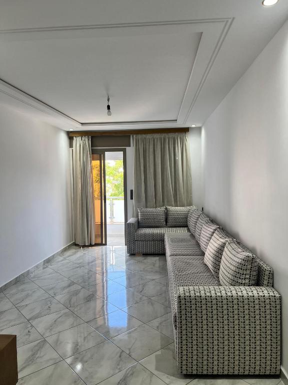 Posezení v ubytování Appartements familiaux confortables à 5 min de la plage Martil شقق عائلية مريحة على بعد 5 دقائق من الشاطئ مرتيل