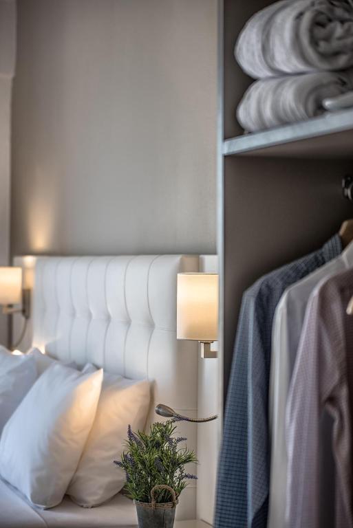 Postel nebo postele na pokoji v ubytování Dore Boutique Hotel