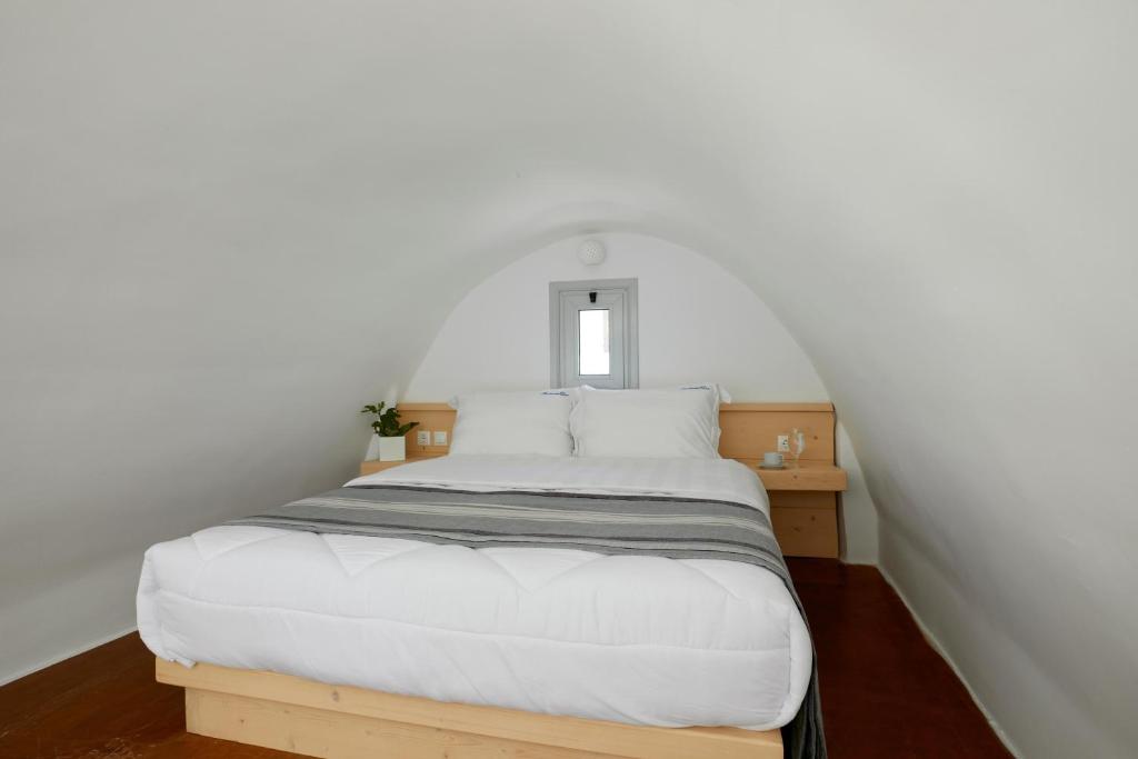 Letto o letti in una camera di Santorini View