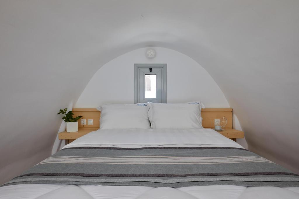 Letto o letti in una camera di Santorini View