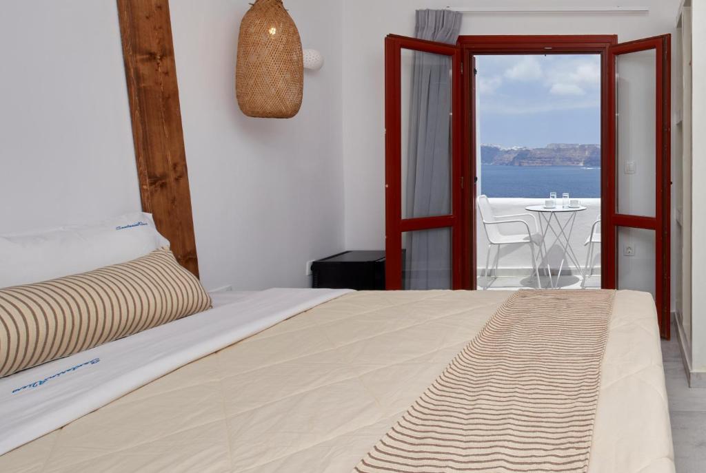 Letto o letti in una camera di Santorini View