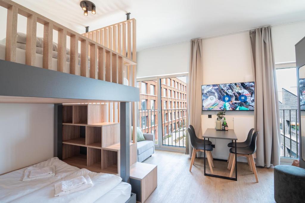 Postel nebo postele na pokoji v ubytování Homaris Apartments Winterhude
