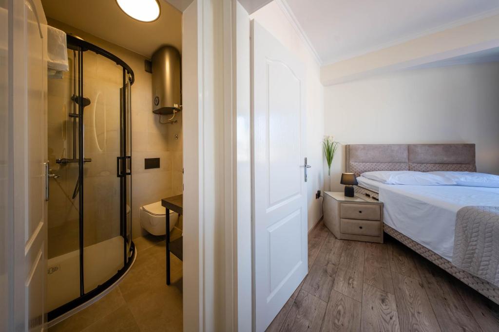Voodi või voodid majutusasutuse Rooms Villa Padre toas