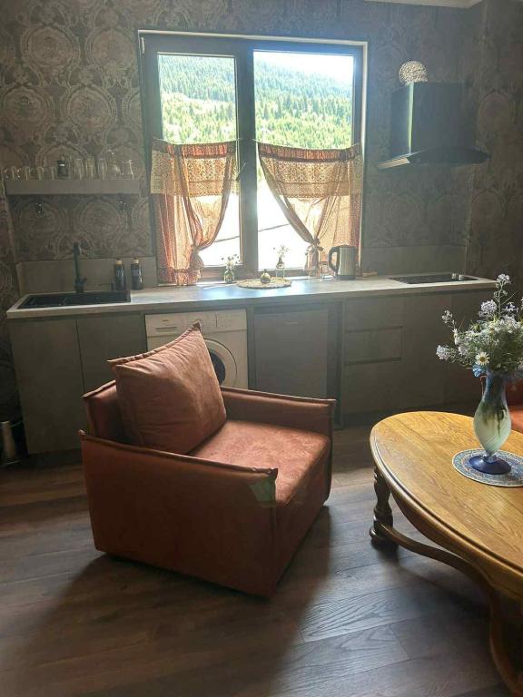Posezení v ubytování Nino Ratiani's Guesthouse