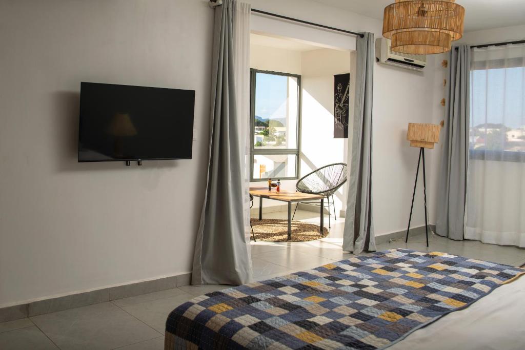 Postel nebo postele na pokoji v ubytování Hotel Naka