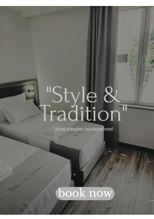 Postel nebo postele na pokoji v ubytování Oborri Shkodran Boutique Hotel
