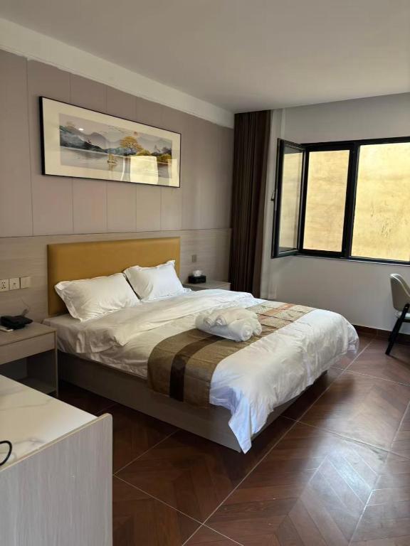 Postel nebo postele na pokoji v ubytování Hotel GoldCoast