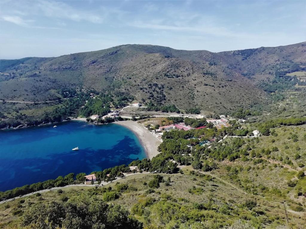 an aerial view of a beach and a lake at Ciudad De Vacaciones Cala Montjoi in Roses