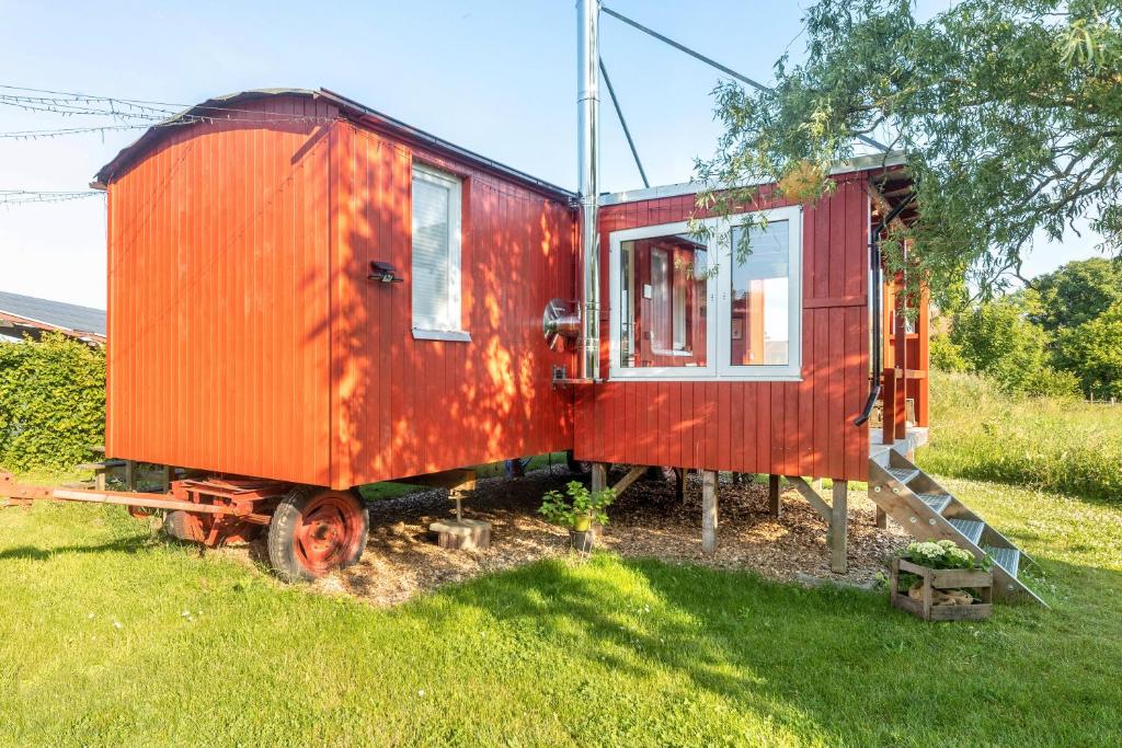 Aed väljaspool majutusasutust Tiny House im Grünen