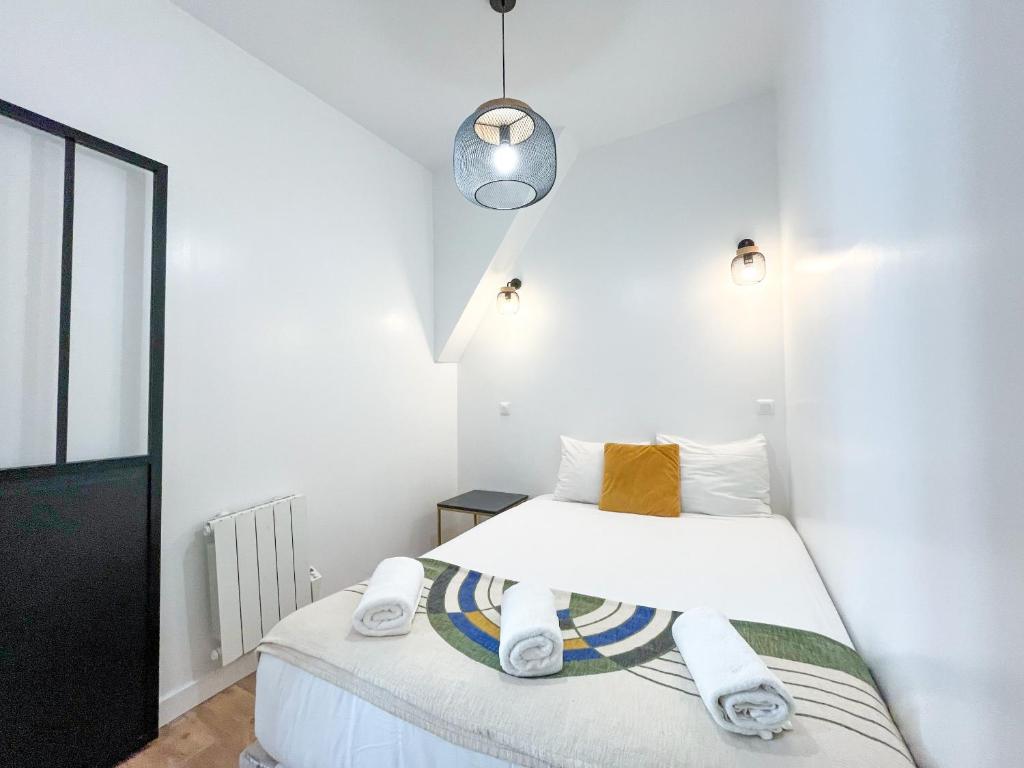 Posteľ alebo postele v izbe v ubytovaní 146 - Urban Cosy Flat in Paris