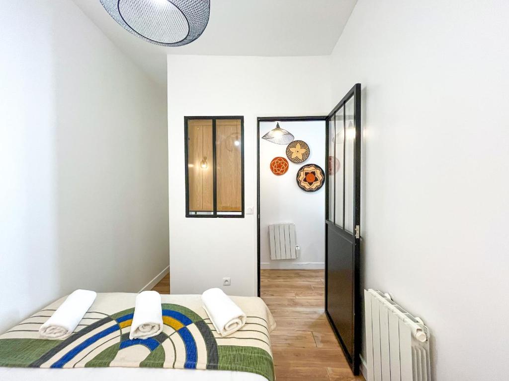 Posteľ alebo postele v izbe v ubytovaní 146 - Urban Cosy Flat in Paris