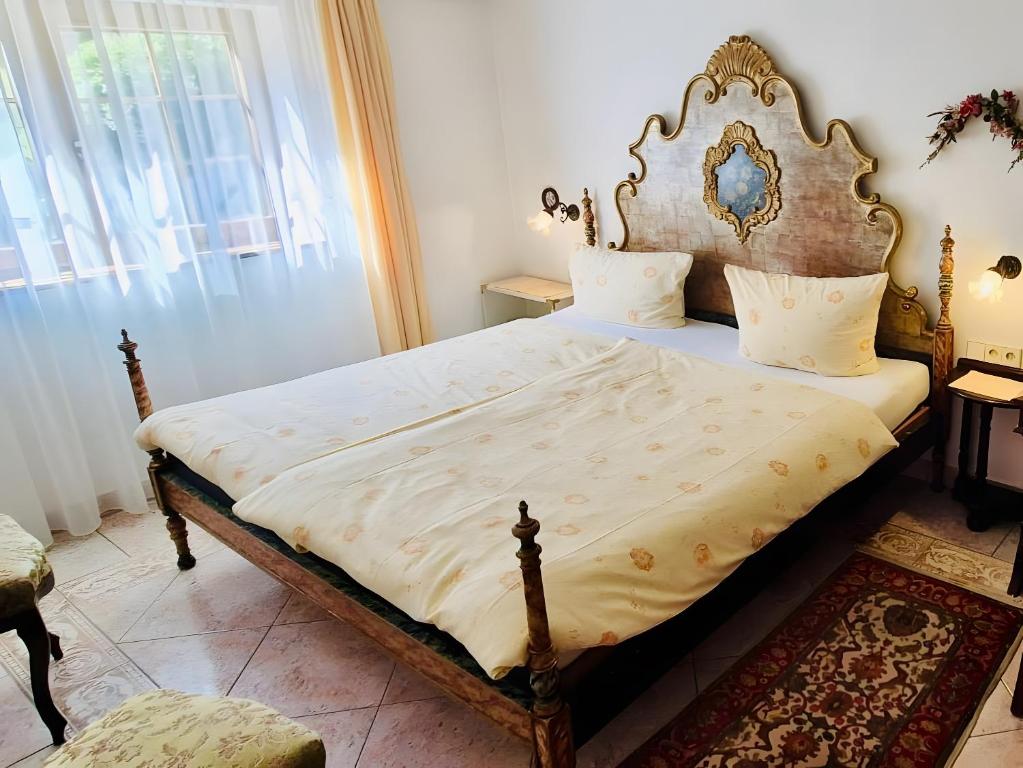 Postel nebo postele na pokoji v ubytování Haus Bachschwalbe