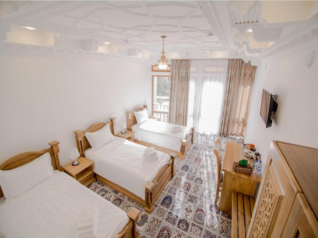 Ένα ή περισσότερα κρεβάτια σε δωμάτιο στο Premium Hotel Labi Rud