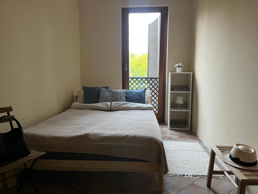 Postel nebo postele na pokoji v ubytování Csopak Strand Apartman