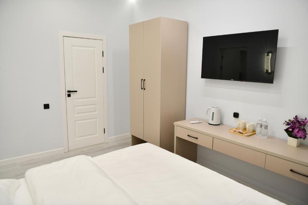 Postel nebo postele na pokoji v ubytování QUT Hotel