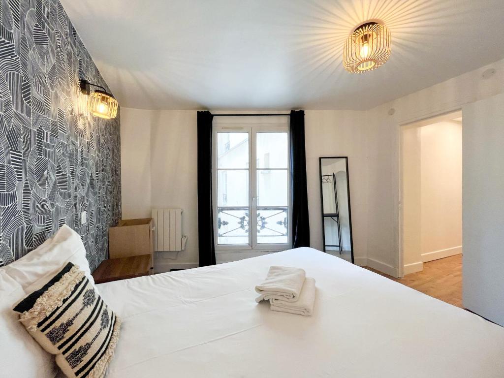 Posteľ alebo postele v izbe v ubytovaní 152 - Urban Cosy Flat in Paris