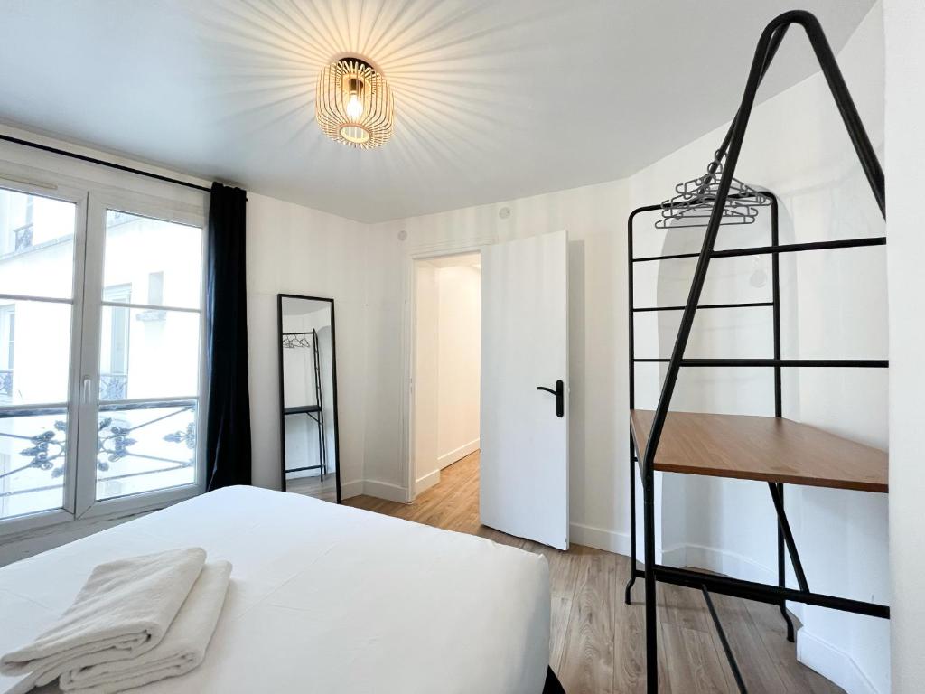 Posteľ alebo postele v izbe v ubytovaní 152 - Urban Cosy Flat in Paris