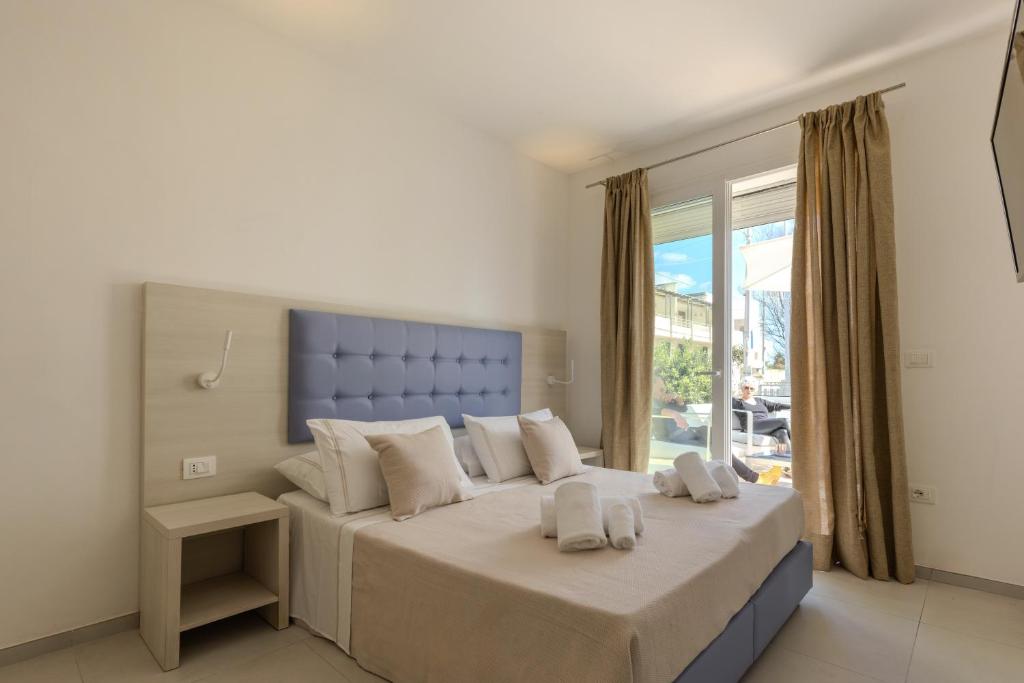 Postel nebo postele na pokoji v ubytování Scirocco Boutique Eco Hotel
