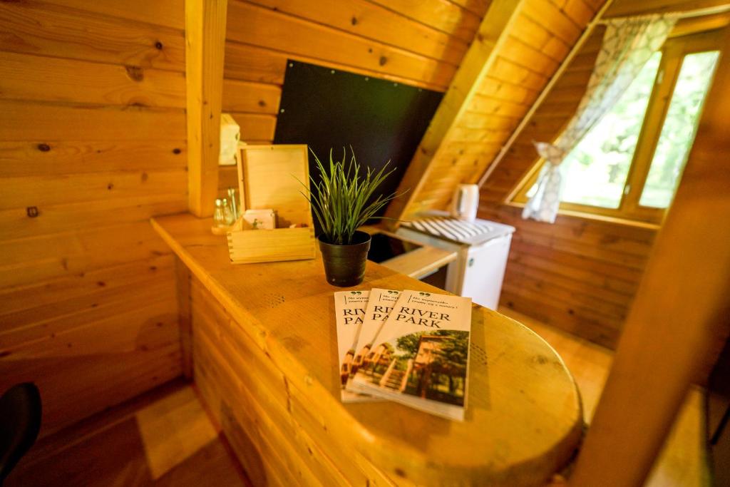 Televízia a/alebo spoločenská miestnosť v ubytovaní River Park