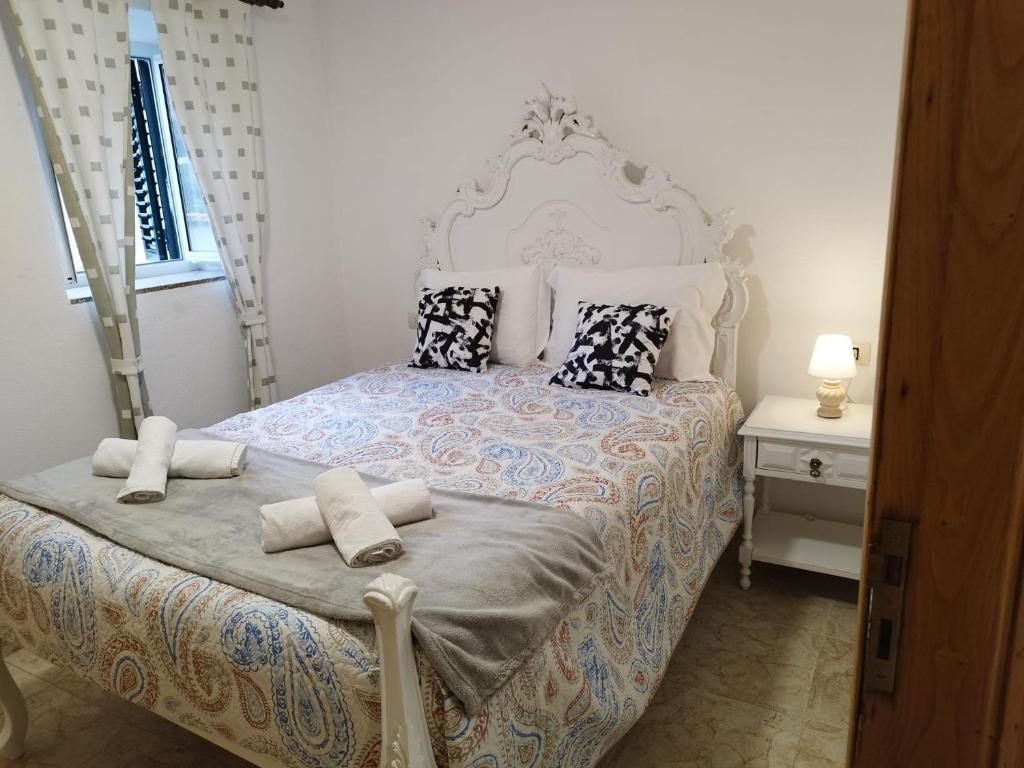 Postel nebo postele na pokoji v ubytování Casa do Corgo